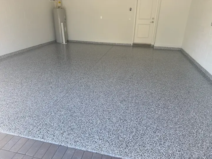Finished gray flake epoxy garage floor in Fort Lauderdale, FL