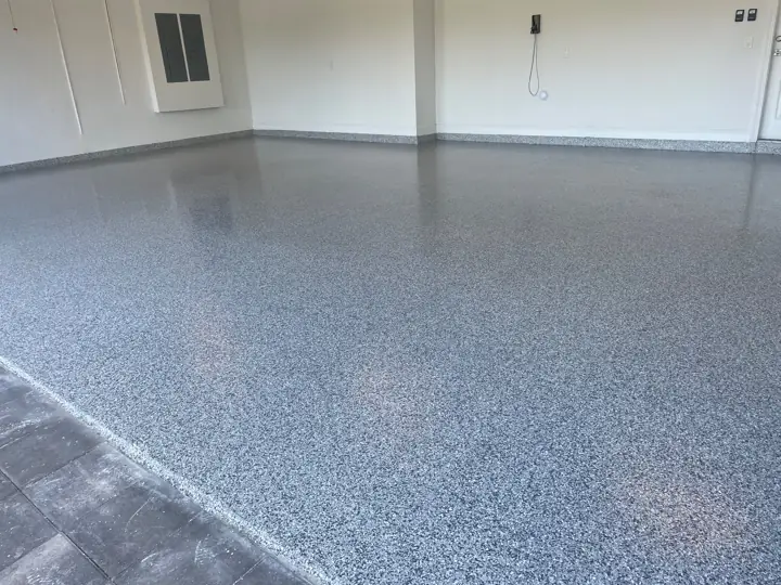 Gray flake epoxy garage floor finished wall to wall in Fort Lauderdale, FL