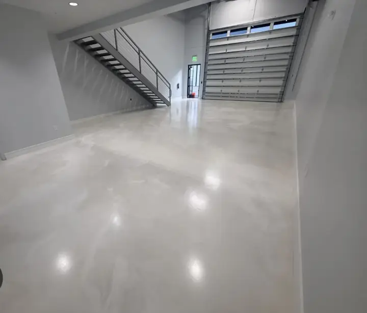 Silver metallic epoxy floor in a two story garage in Fort Lauderdale, FL