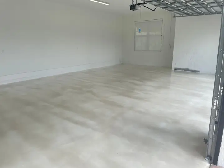 Soft white metallic epoxy floor in a large open room in Fort Lauderdale, FL