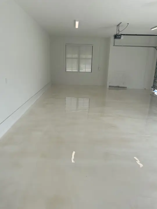 Pearl white metallic epoxy garage floor in Fort Lauderdale, FL